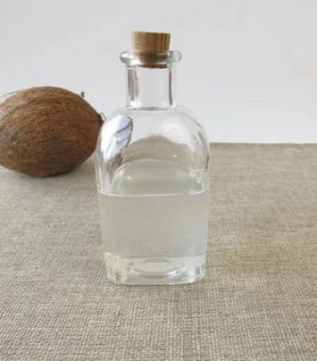 100% EXTRA PREMIUM VIRGIN COCONUT OIL obtained from organic fresh coconut used for cooking and cosmetic