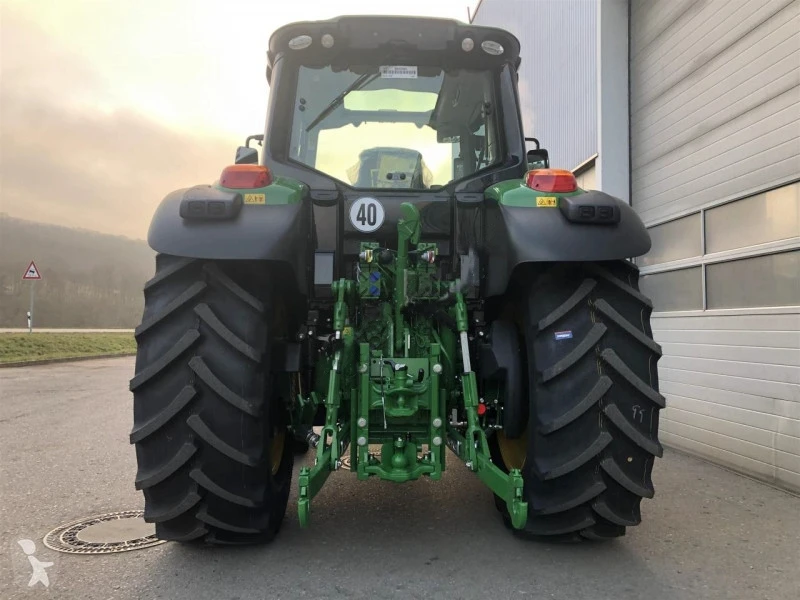 Купить б/у сельскохозяйственный трактор John Deere 6120 м на