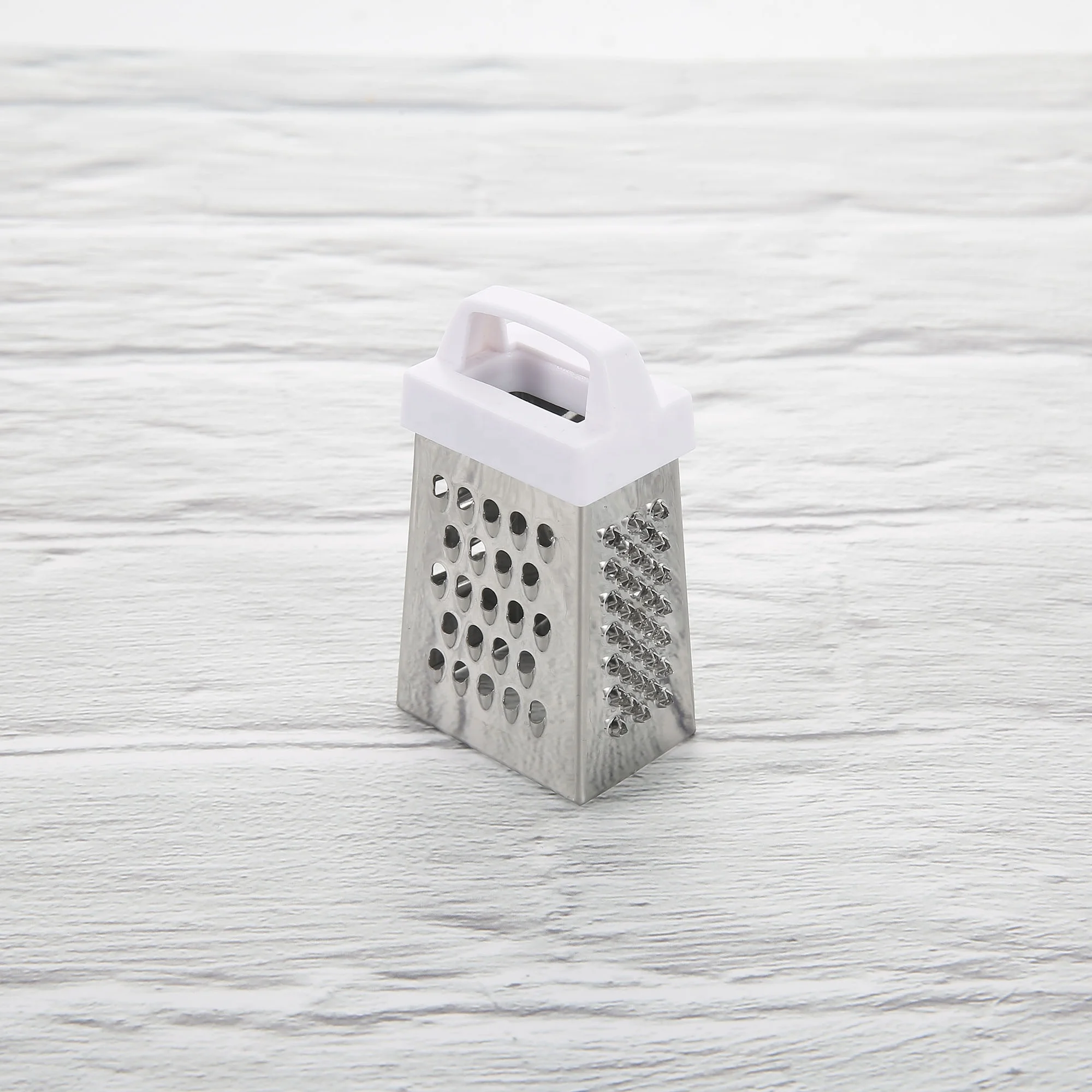 Incredible Stainless Steel 4 sided Mini Grater for Food Parmesan Cheese Ginger Vegetables Lemon Garlic Nutmeg Chocolate Fruits