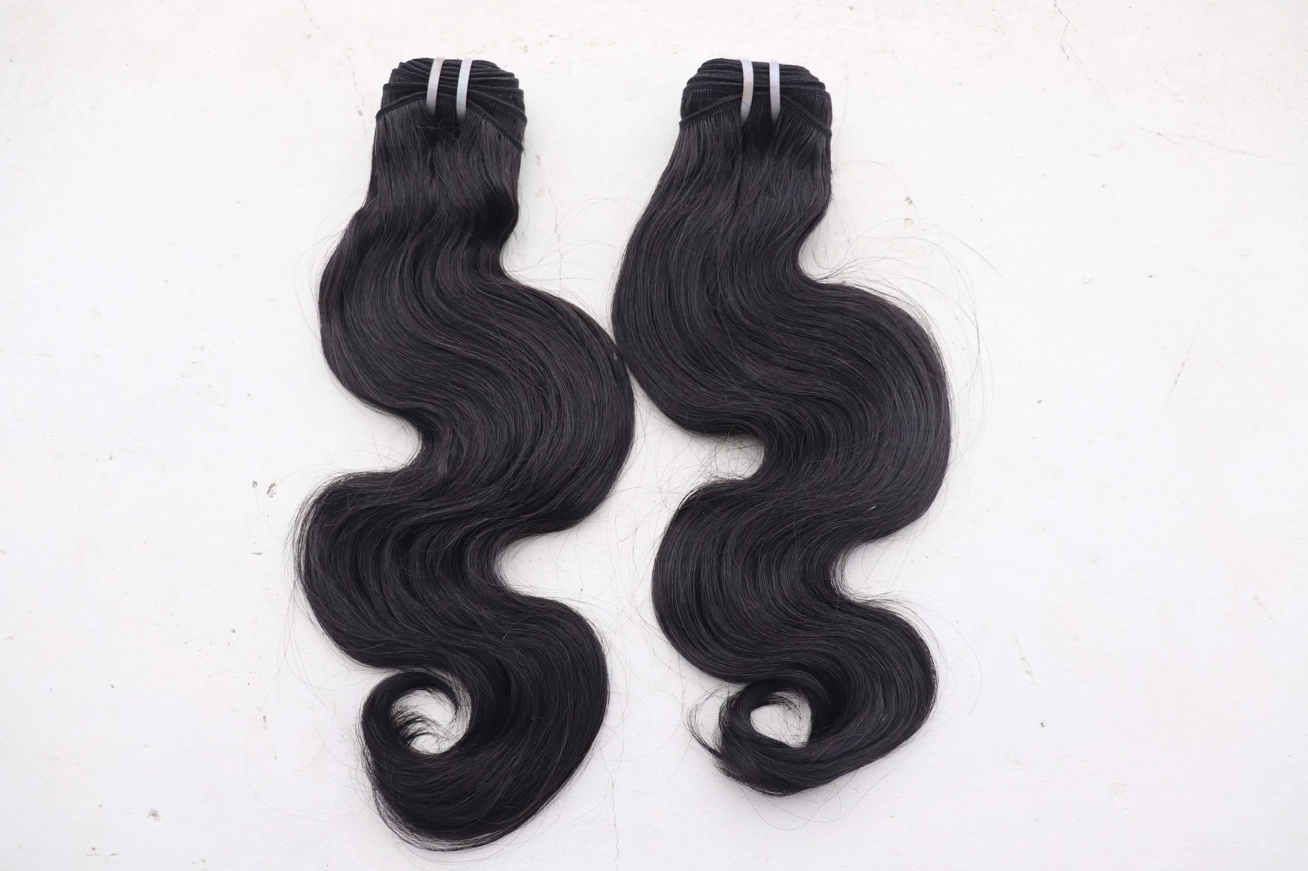  [Топ] бестселлер волнистые волосы изготовленные из необработанных натуральных волос 100% вьетнамские натуральные необработанные лучшее качество