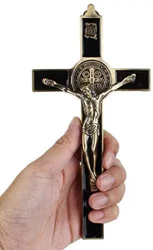 The Saint Benedict Cross  is a Christian sacramental medal containing symbol of opening doors and opening difficult paths