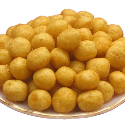 Экзотическая закуска, вьетнамские шариковые пирожные от яйца, кунжута, желтые цветы, липкий рис