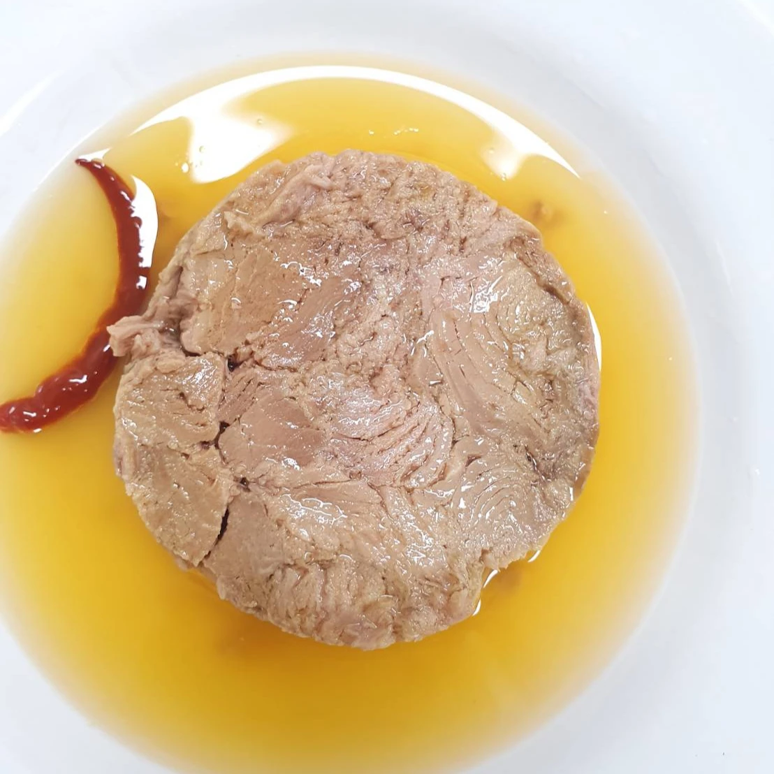 Консервированный твердый тунец в подсолнечном масле из Таиланда