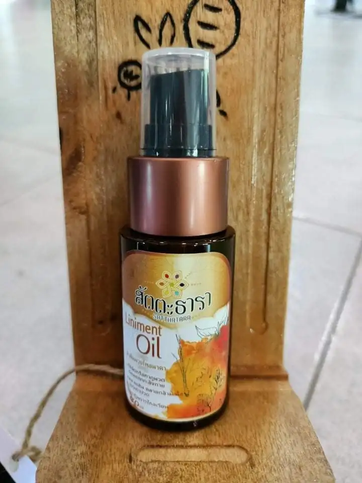 The premium herbal Massage Oil of Liniment Oil  Product of  Thailand