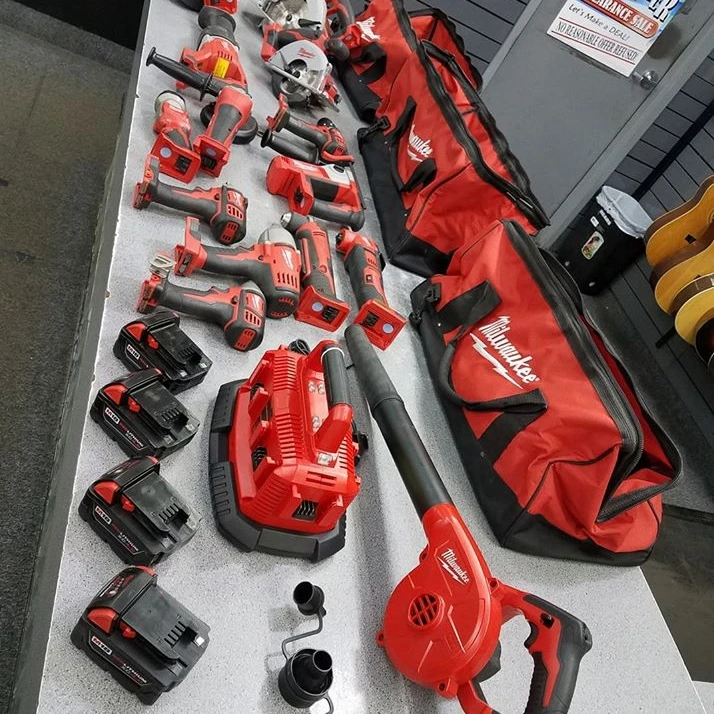 
Milwaukees M18 18-Volt Lithium-Ion Cordless Combo Tool Kit (15-Tool) with (4) 4.0Ah Batteries, (1) 6-Port Charger, (3) Tool Bags 