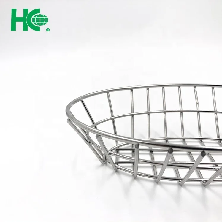 oval fast food restaurant serving metal bread basket