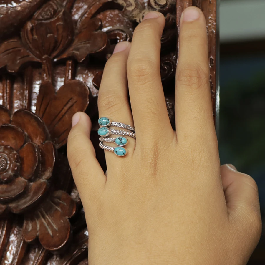 
Carved Overlapping Silver Ring with Turquoise 