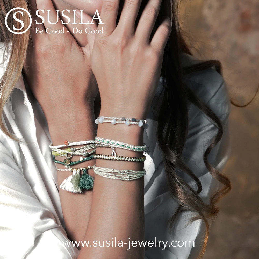 
Bracelet with Javanese Handmade Glass Beads and Silver Color Beads on Two Lines of Hand-twisted Cotton String 