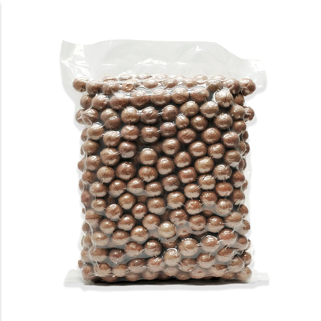 Сушеные Орехи макадамии ручной очистки размер 22 - 25 мм класс B в вакуумной упаковке конкурентоспособная цена