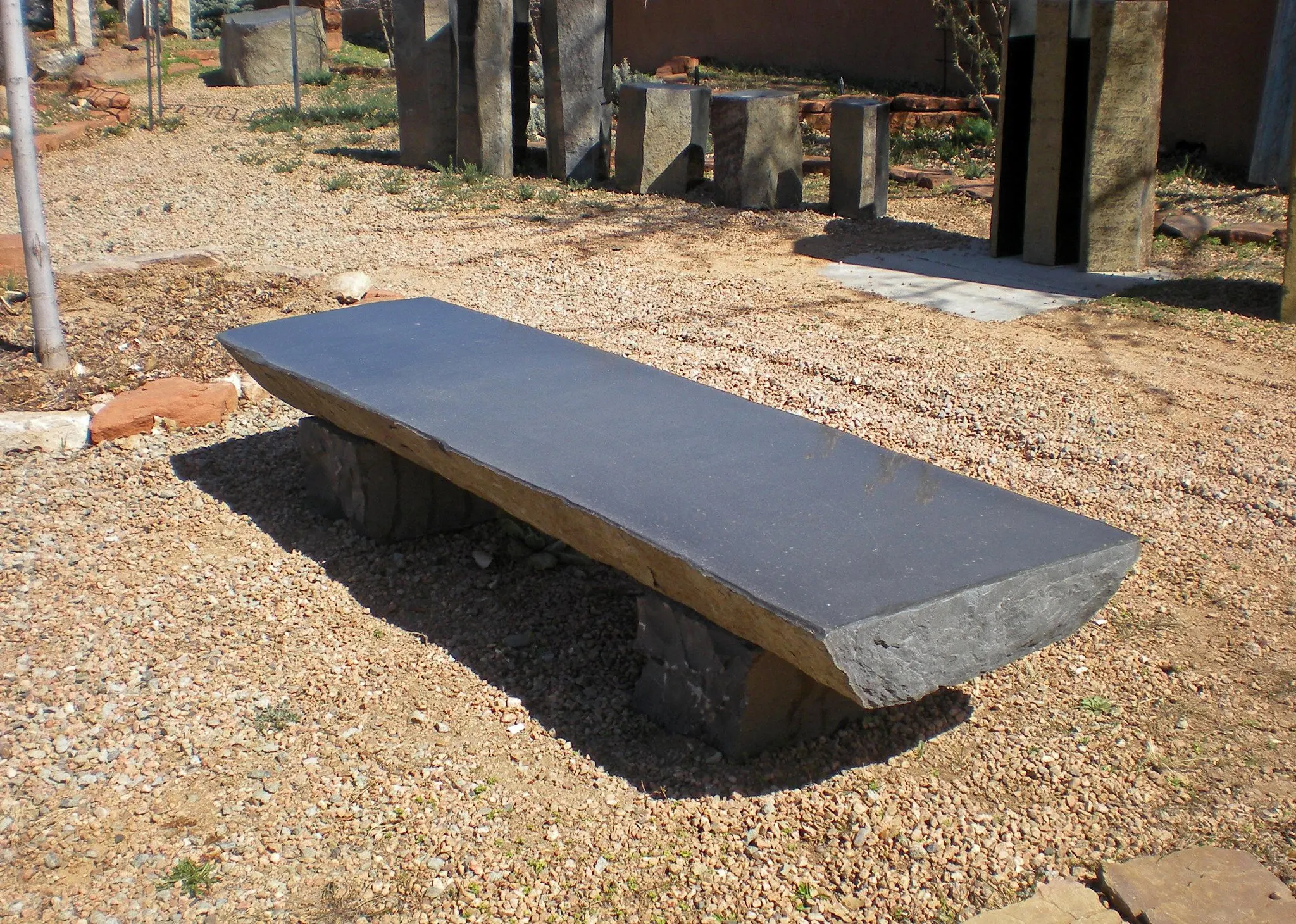 New Design Outdoor Decorative Natural Stone Long Monolithic Black Boulder Polished Basalt Wavy Bench with Back for Garden Patio