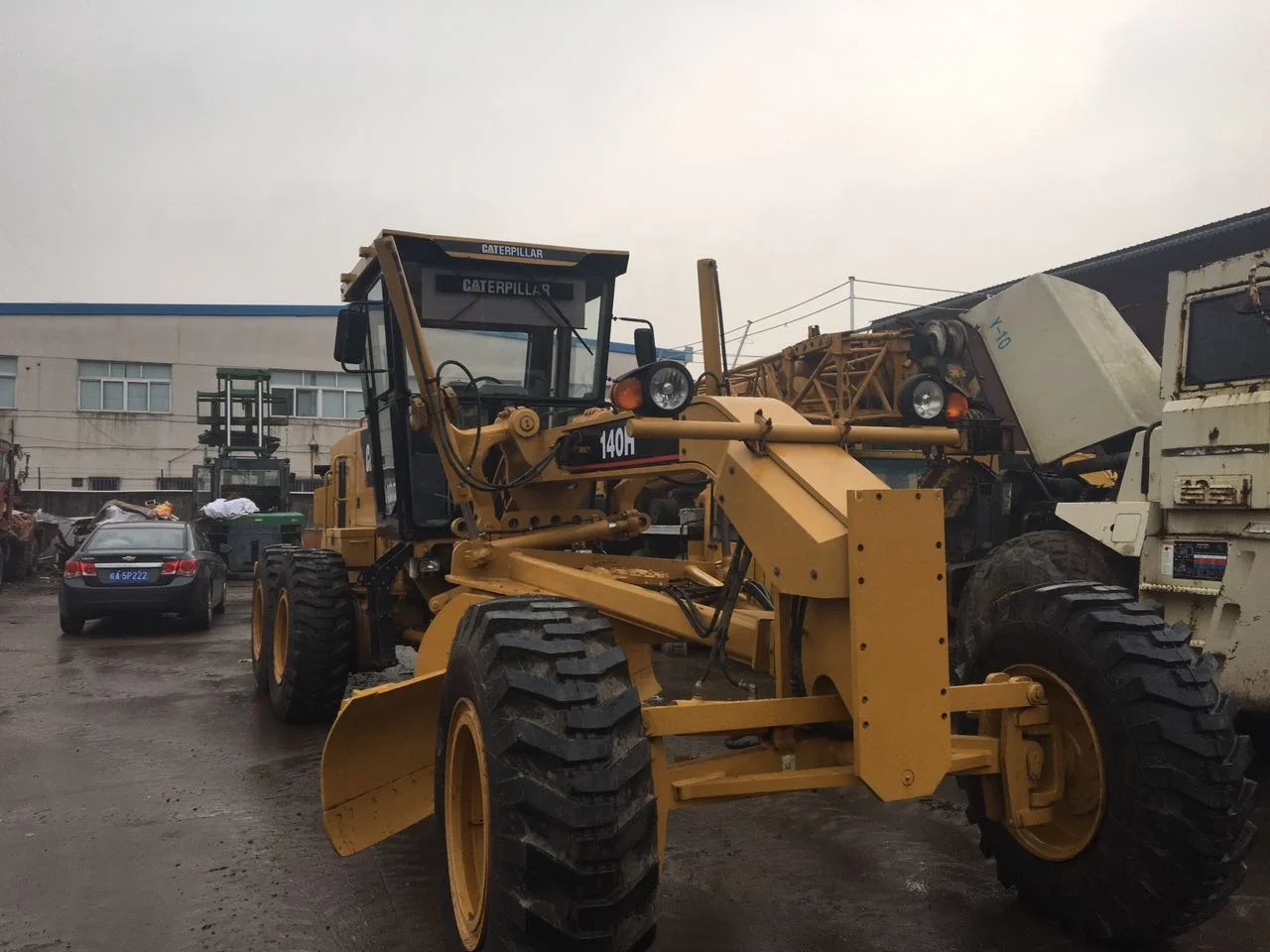 Автогрейдер Caterpillar140H сделано в