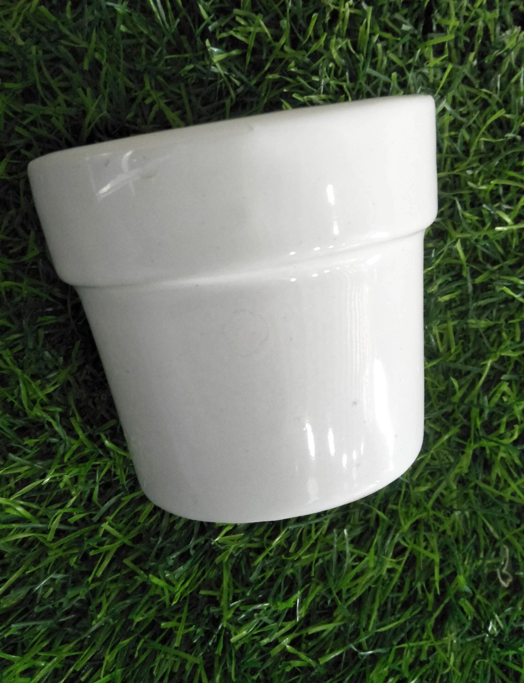 Ceramic mini planter pots for Cactus and succulents in white glaze and various colors used for indoor as well as outdoor