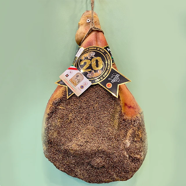 Italian food MACELLERIA BACCI cured pork meat pork leg tuscan prosciutto DOP raw and seasoned