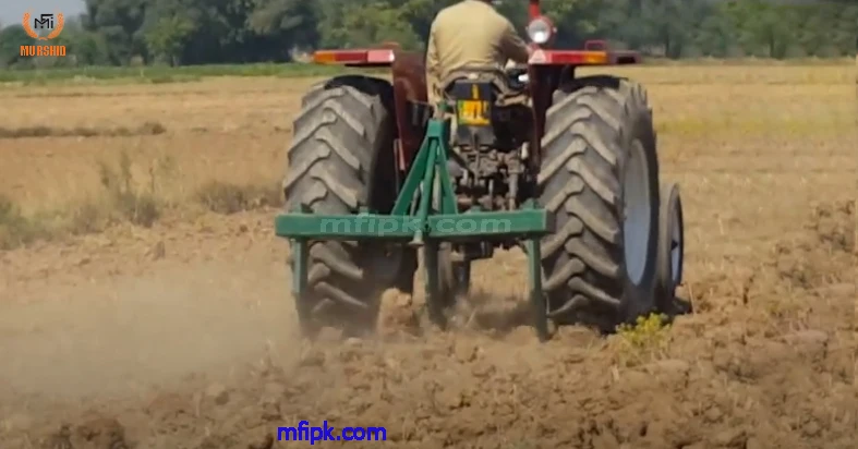 MF Tractor With 5 Tine Chisel Plough
