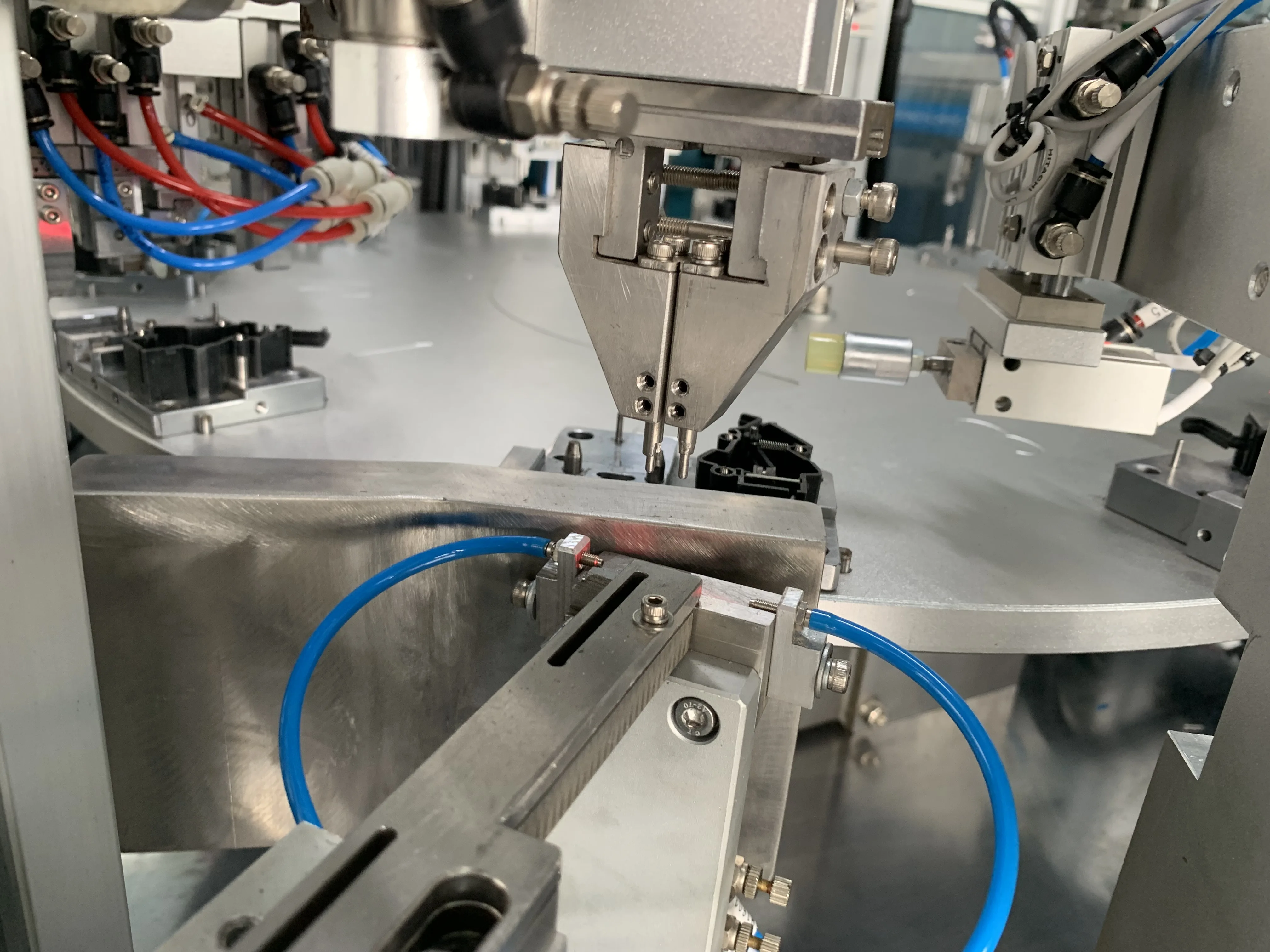 New Automated Machine for Sweeping Robot Collision Switch Assembly Production