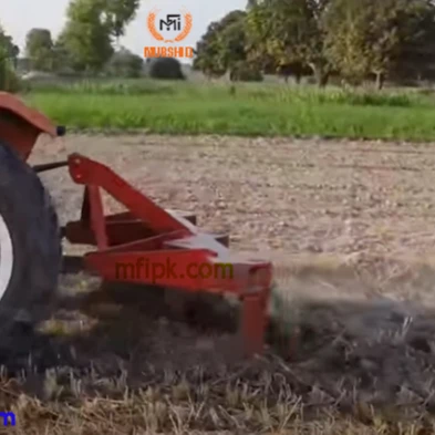MF Tractor With 5 Tine Chisel Plough