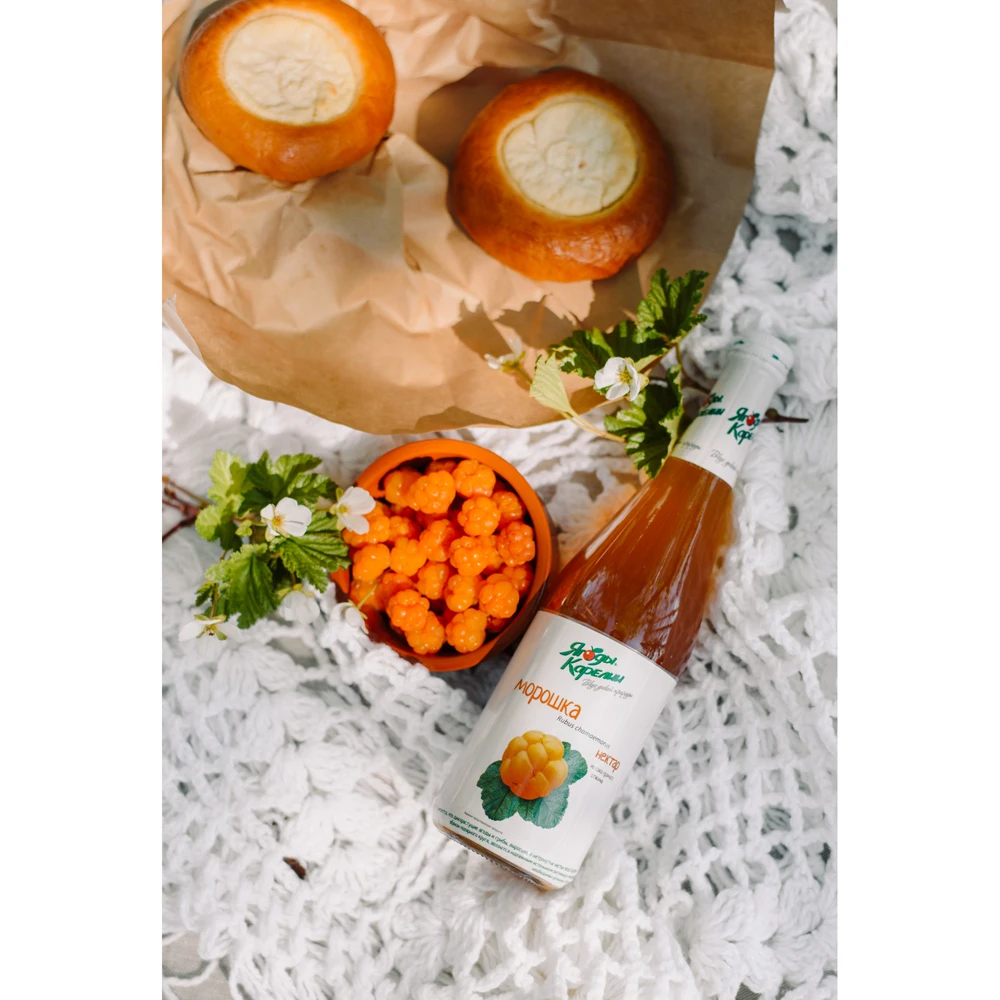 High quality natural cloudberry nectar in glass bottles, soft drinks
