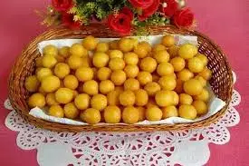 Экзотическая закуска вьетнамские шариковые пирожные от яйца кунжута желтые цветы липкий рис