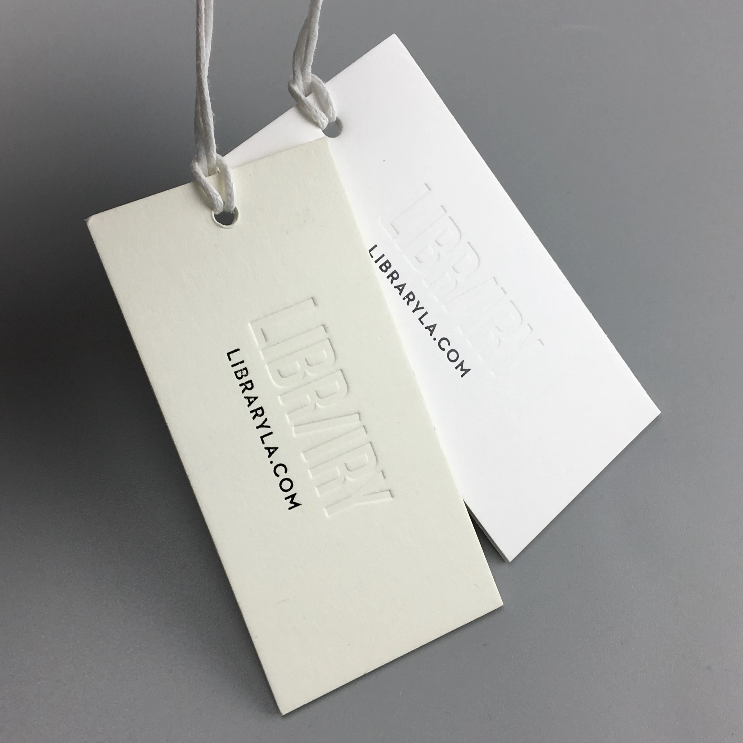 Eco-friendly Brand Logo OEM Custom Special Paper Cardboard Tag Swing Tag For Clothes Tshirt Hang Tags