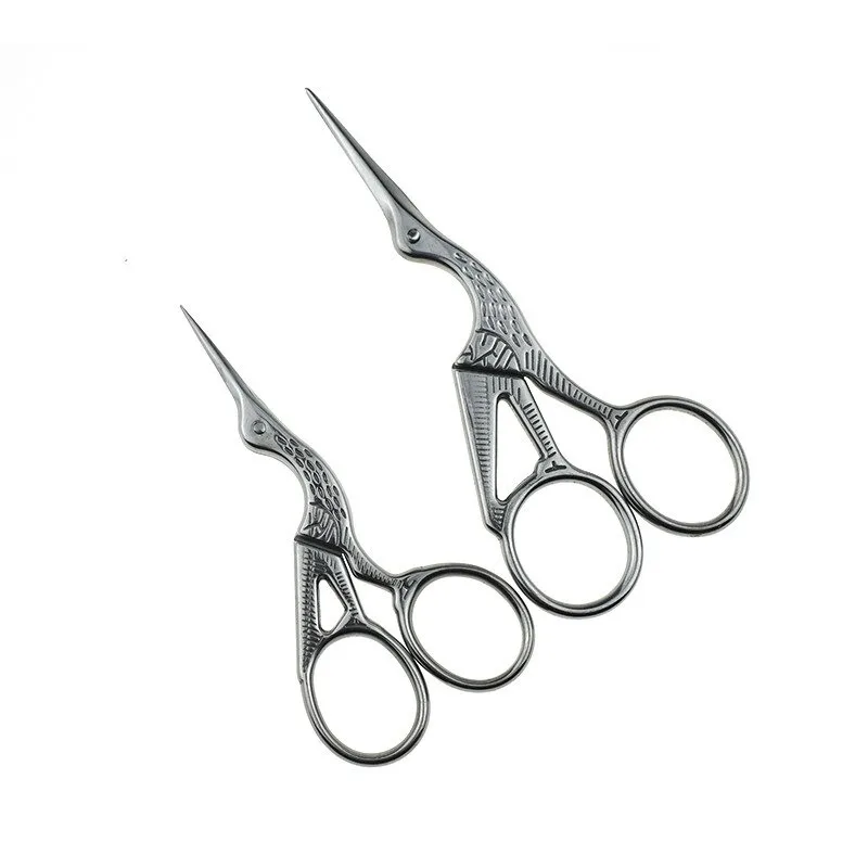 Необычные ножницы с вышивкой и рукояткой