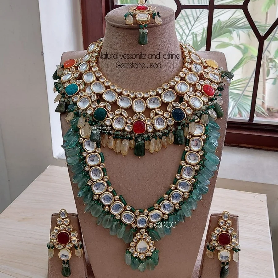 latest fashion big real kundan bridal set with long and choker set with earring and mangtikka by M Creation