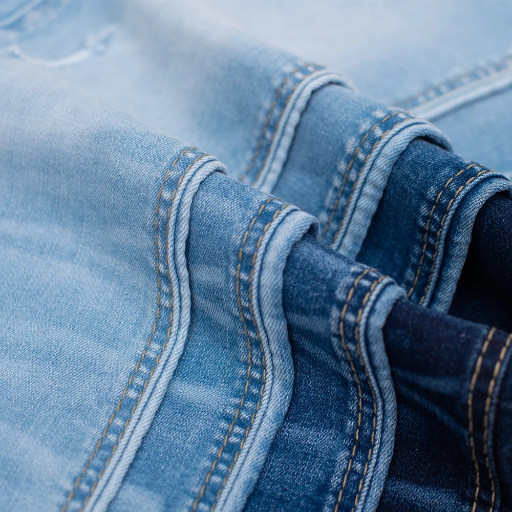  Хлопчатобумажная джинсовая ткань/эластичная ткань для оптовой продажи (TL319155) из Вьетнама с тщательно упакованной и быстрой реакцией