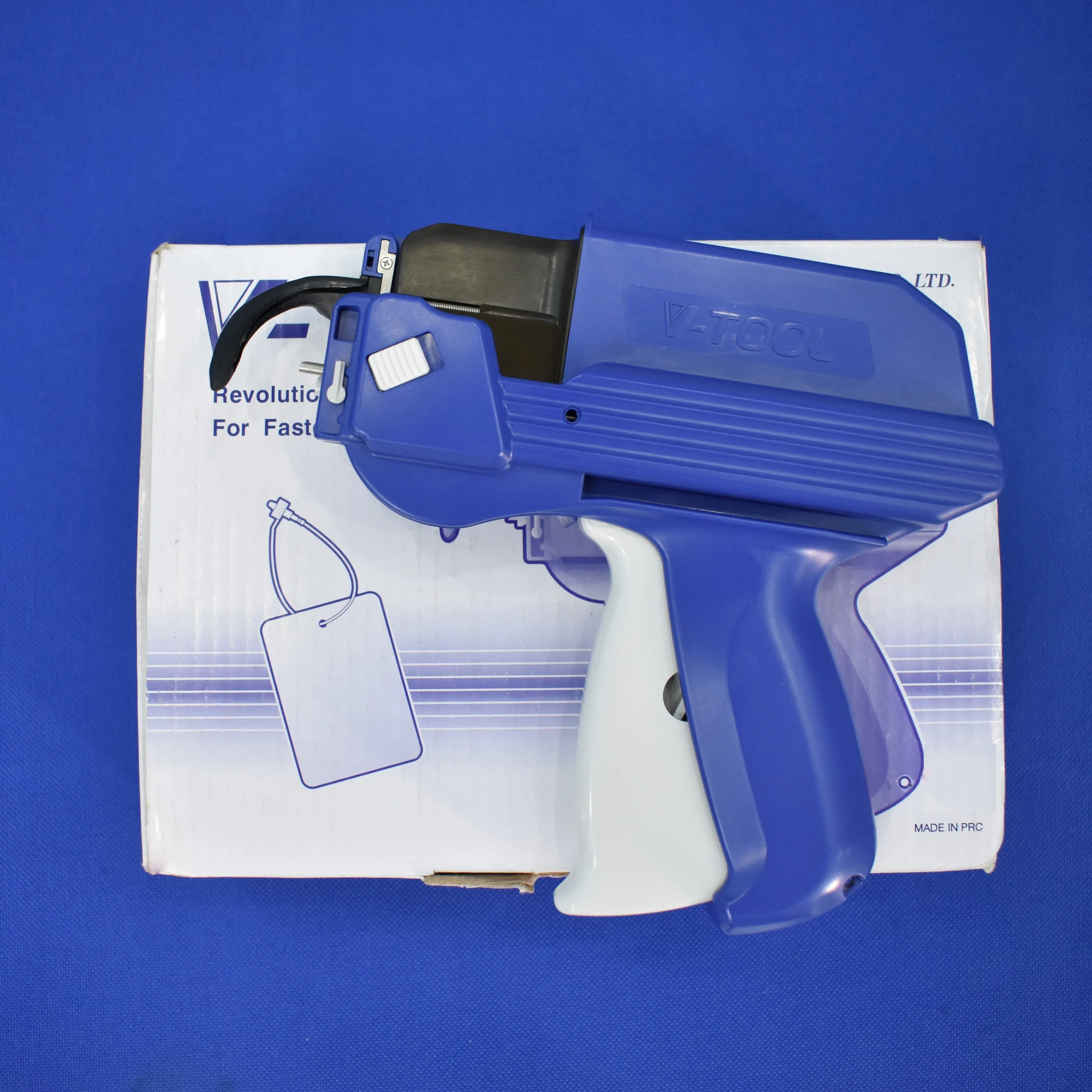 The best selling new style tagger gun V-Tool use for locking fasteners with label jeans clothes t shirt belt apareal