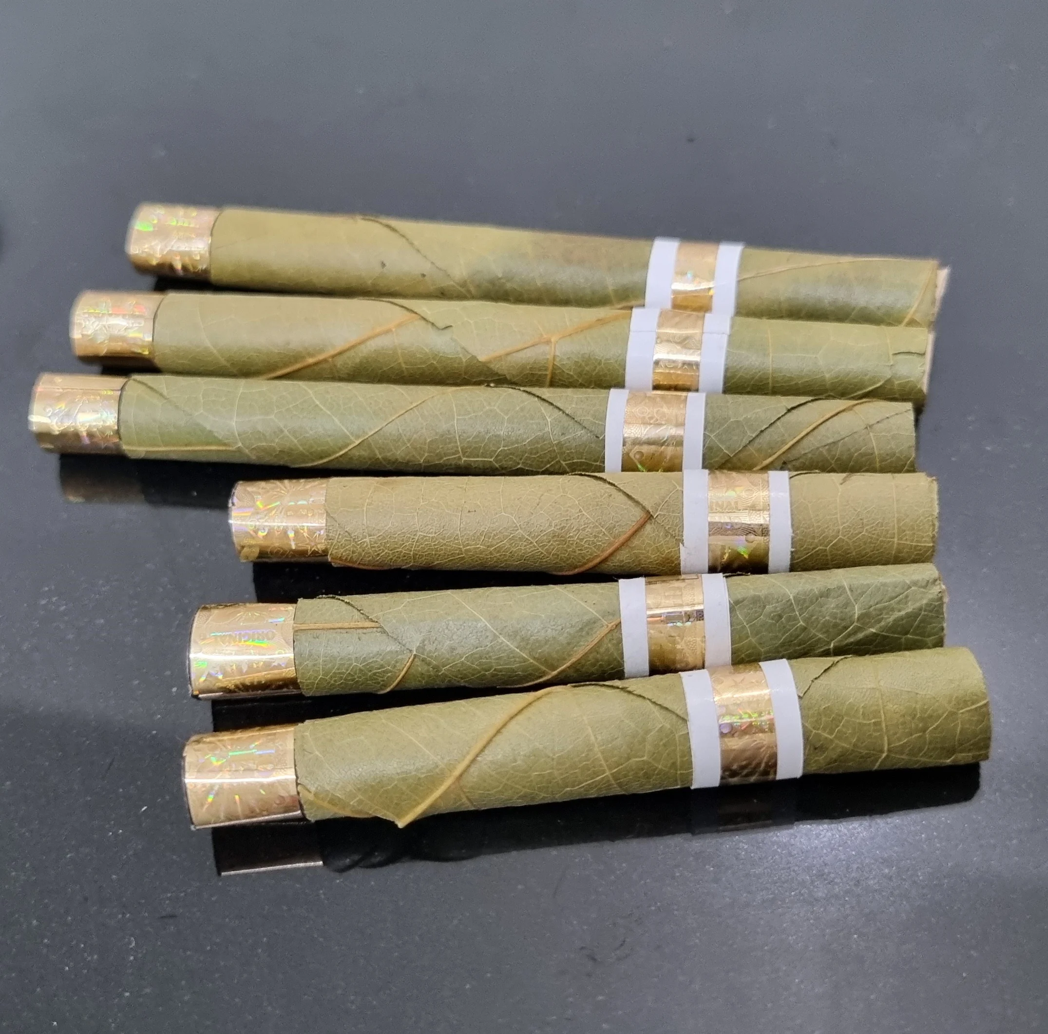 Пользовательские бренды OEM с изображением зеленых листьев и cordia тенду предварительно холоднокатаной лист воздушным охлаждением торговли шелухой корна фильтры конусов для клиентов из