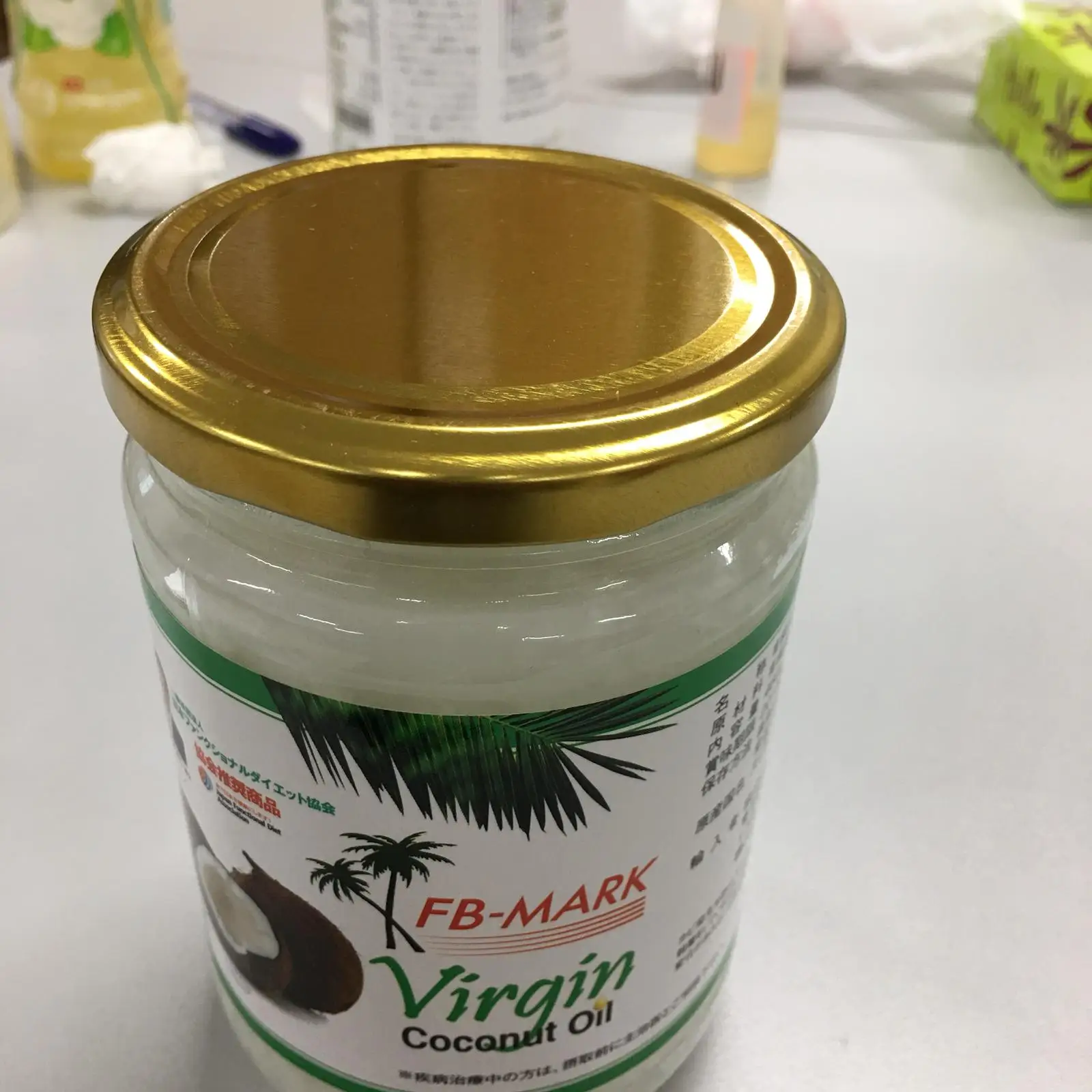 Organic White Extra Virgin Coconut Oil in 1L glass bottle made in Sri Lanka