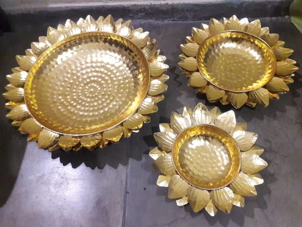 Iron platter in gold colour with design of line on lotus leaves and multiple shades of colour Diwali item new designee