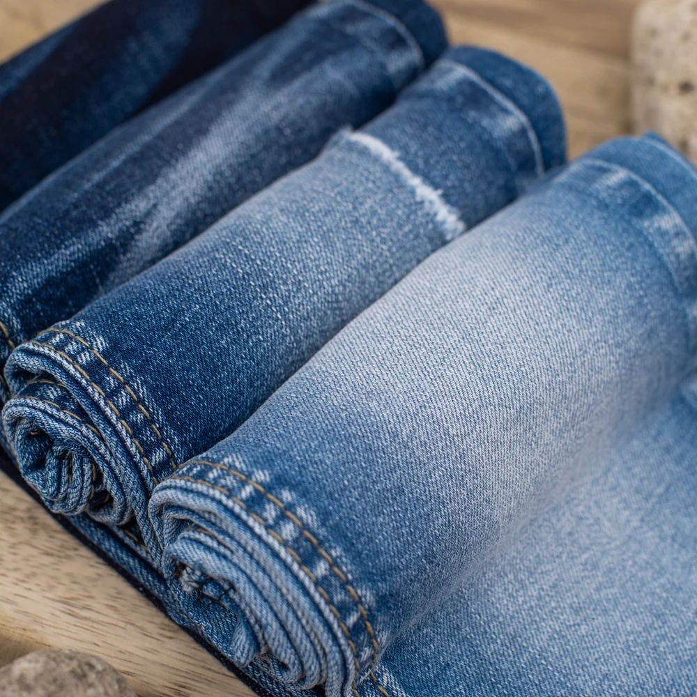  Хлопчатобумажная джинсовая ткань/эластичная ткань для оптовой продажи (TL319155) из Вьетнама с тщательно упакованной и быстрой реакцией