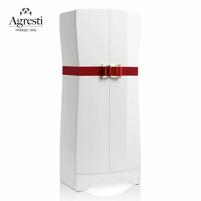 Polished white Birds armoured armoire with leather bow. Leather handles on drawers