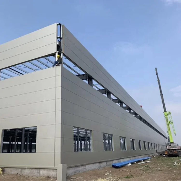 Low price prefabricated steel frame building for warehouse / workshop / hangar