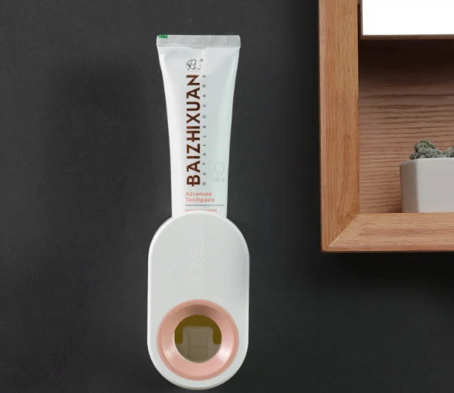 Wholesale Wall Mount Hands Free Squeezer Automatic Toothpaste Dispenser toothbrush holder set for Bathroom simple style