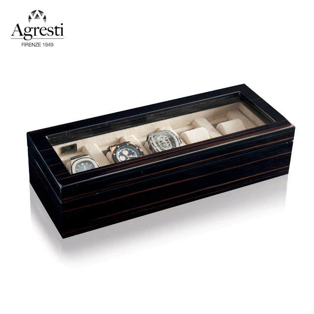 Box in polished ebony for 5 watches lined in protective ultrasuede. Hinge in ruthenium. Box watches