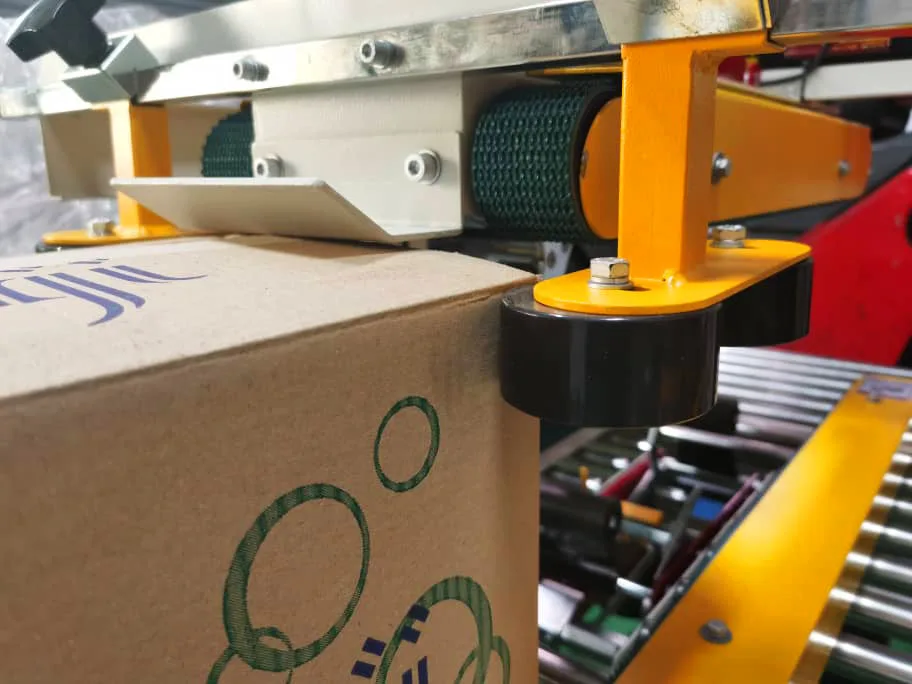 
Food And Beverage Factory And Food Shop Use Semi Auto Top And Side Belt Carton Sealer 