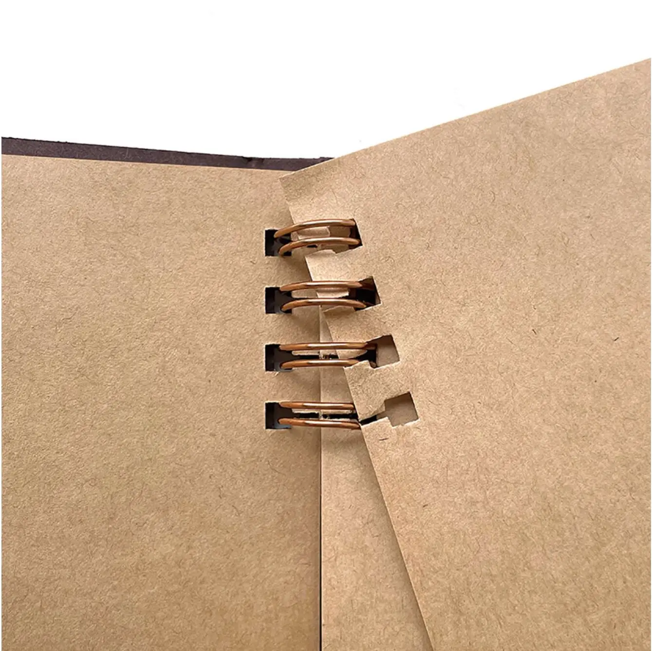 W-ring notebook made of thick kraft paper that lets you add, remove and rearrange the pages.