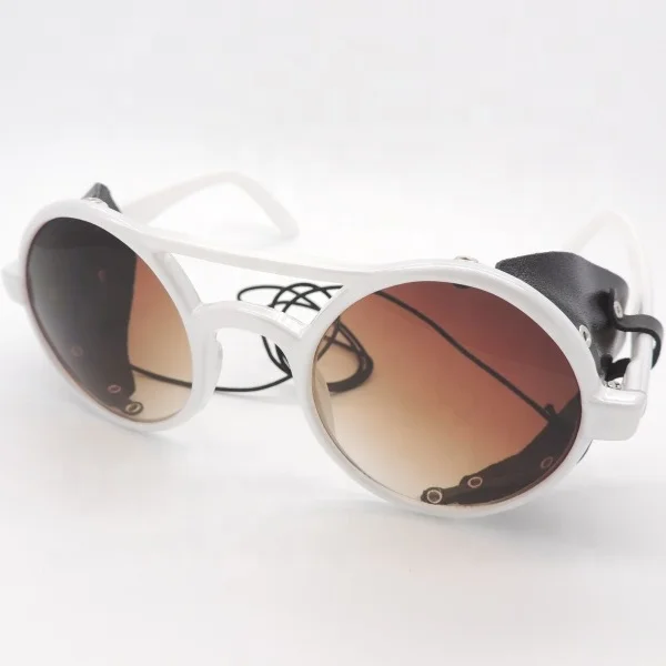 Round designer sunglasses with leather side shield