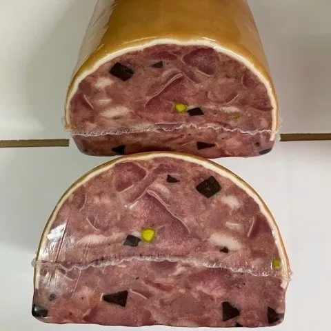 Iberian pork with pieces of truffle and whole premium quality pistachios, ready to eat.