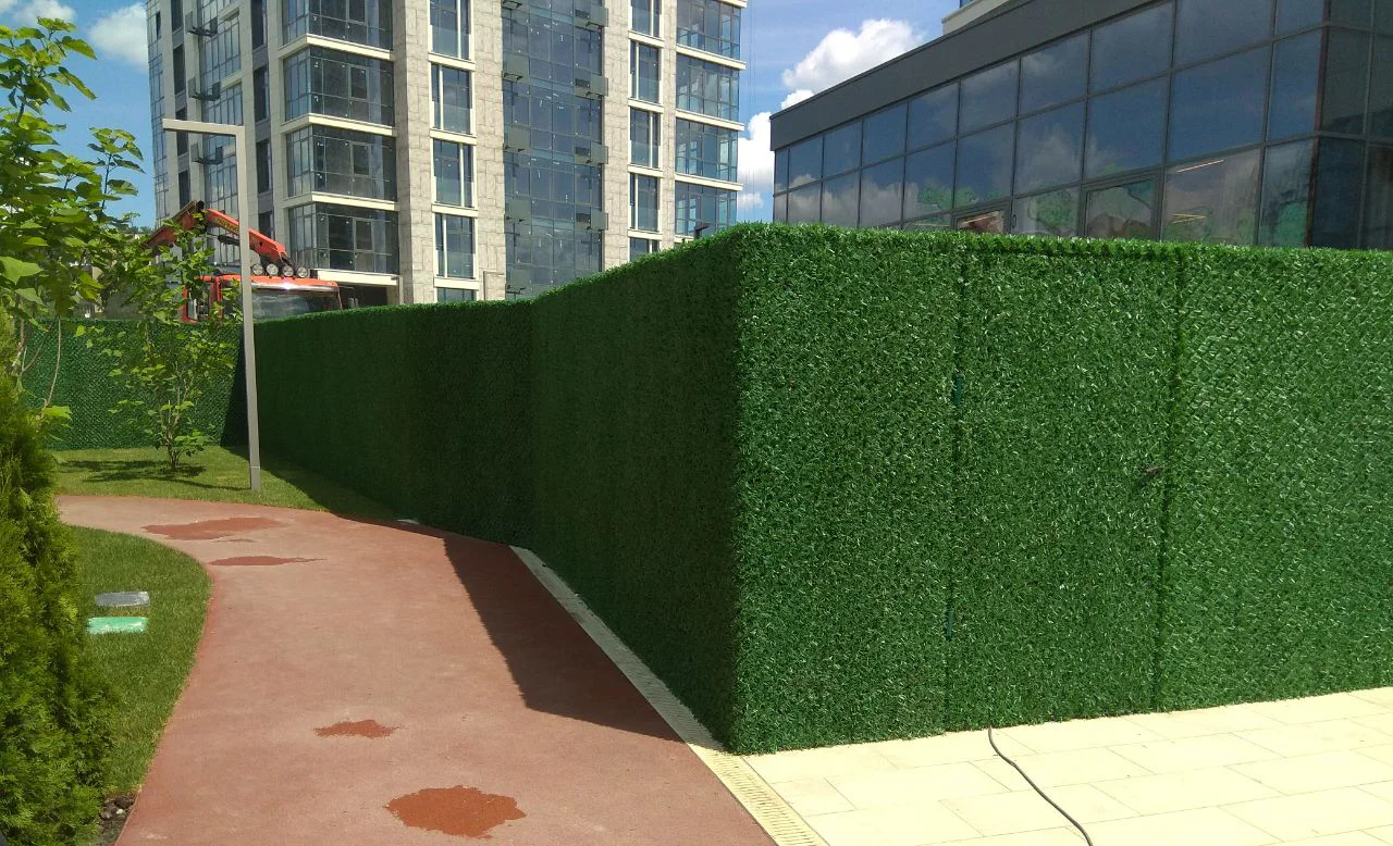 Best price  European artificial grass fence panels manufacturer  for outdoor walls  and privacy usages artificial flower garden