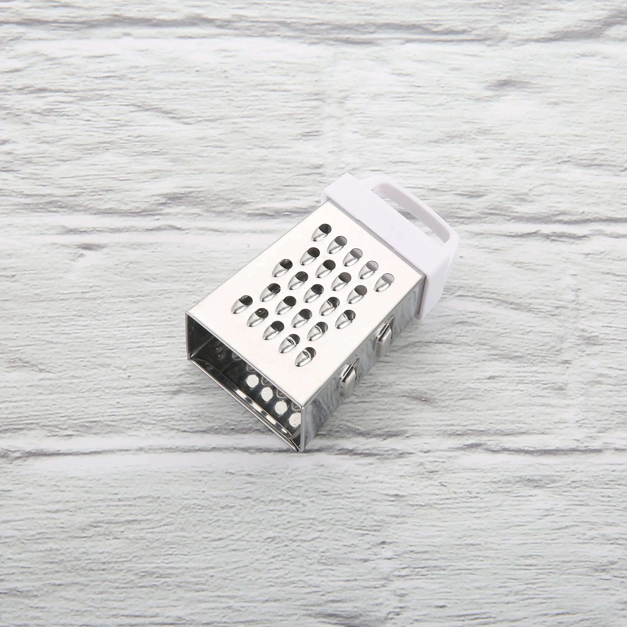 Incredible Stainless Steel 4 sided Mini Grater for Food Parmesan Cheese Ginger Vegetables Lemon Garlic Nutmeg Chocolate Fruits