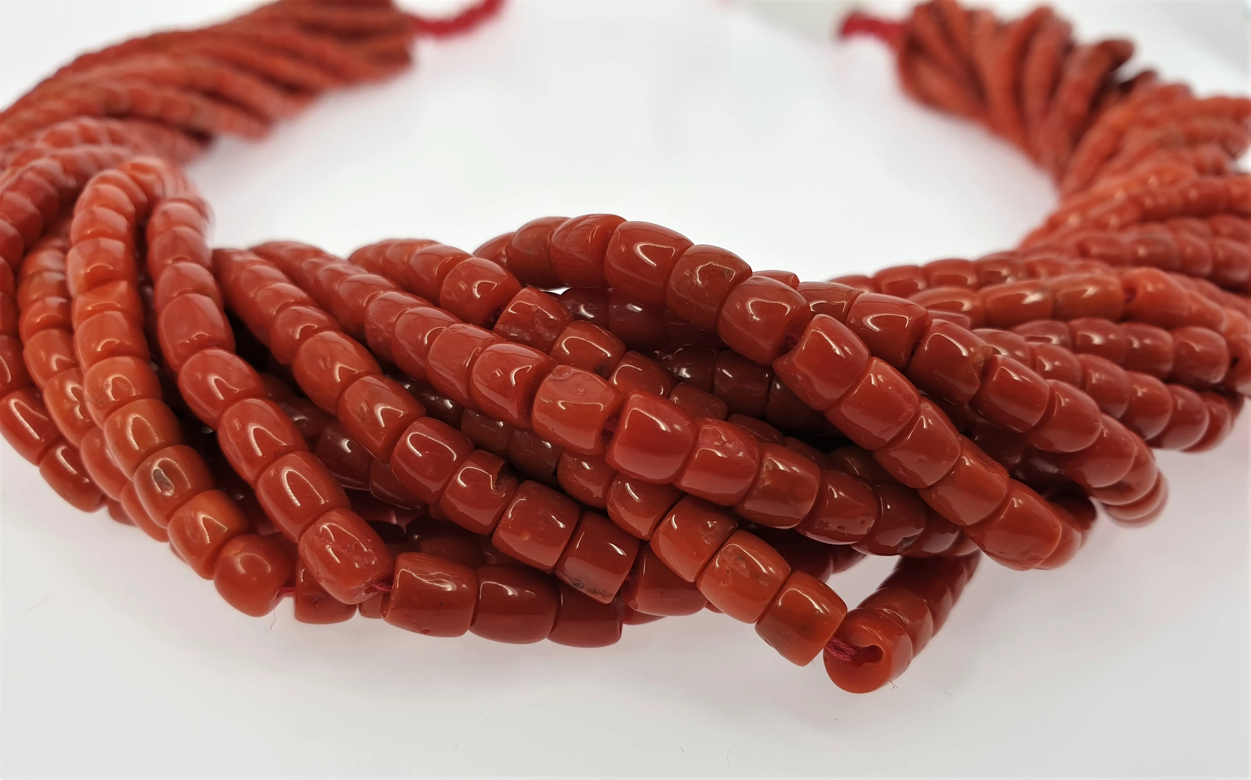 RED CORAL DRUM BEADS 8 MM STRANDS