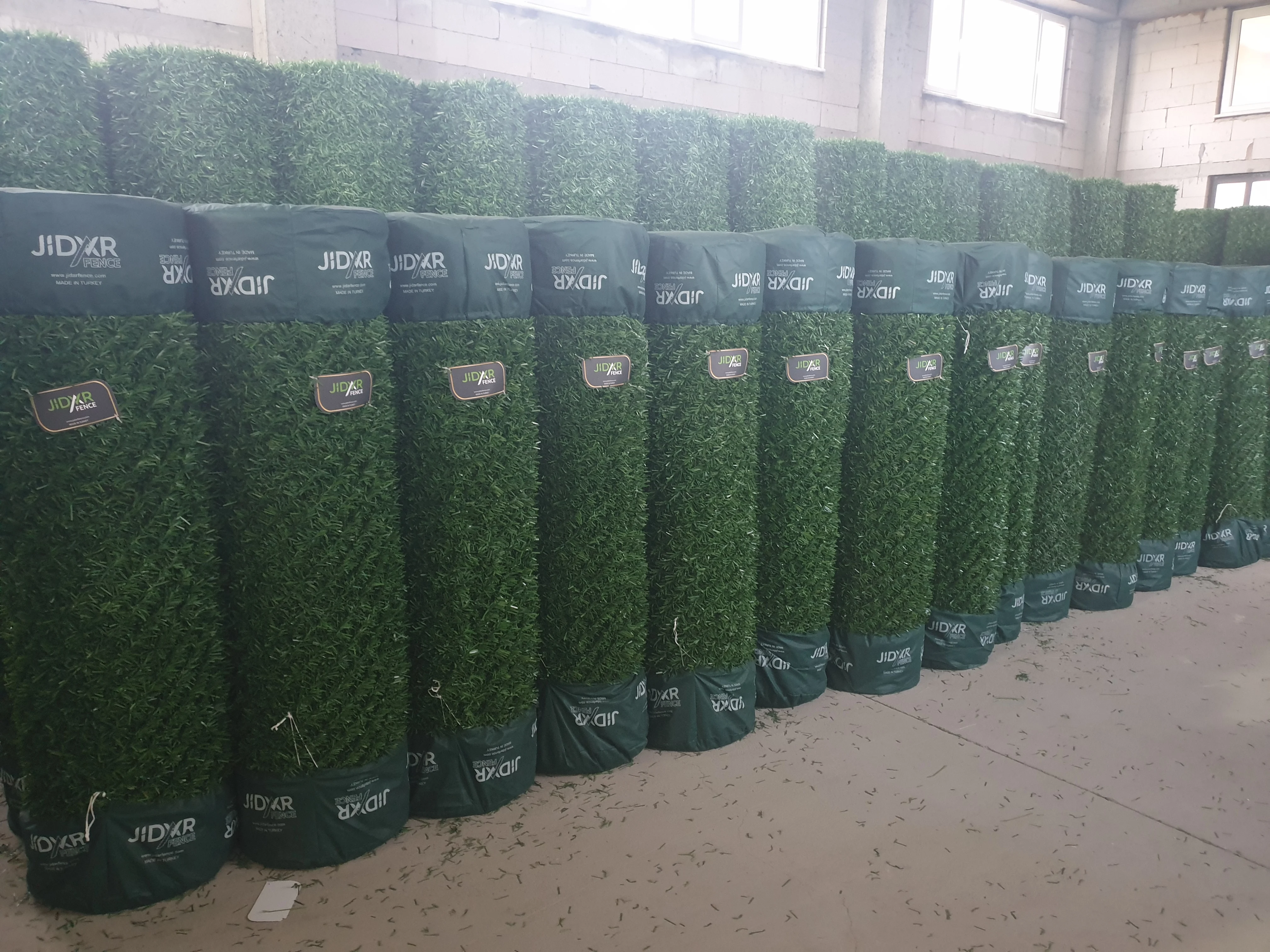 Red colour grass fence panels for gardens made from high quality pvc anti UV made in Turkey in different sizes and heights