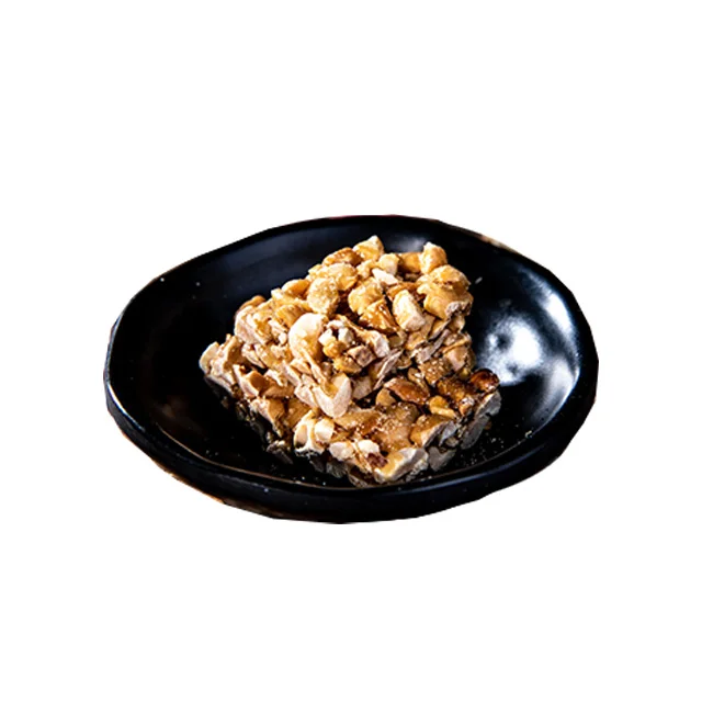 Искусственный арахис, сладость ломтевая гранола, покрытая карамельным сиропом, приносит пользу Таиланду