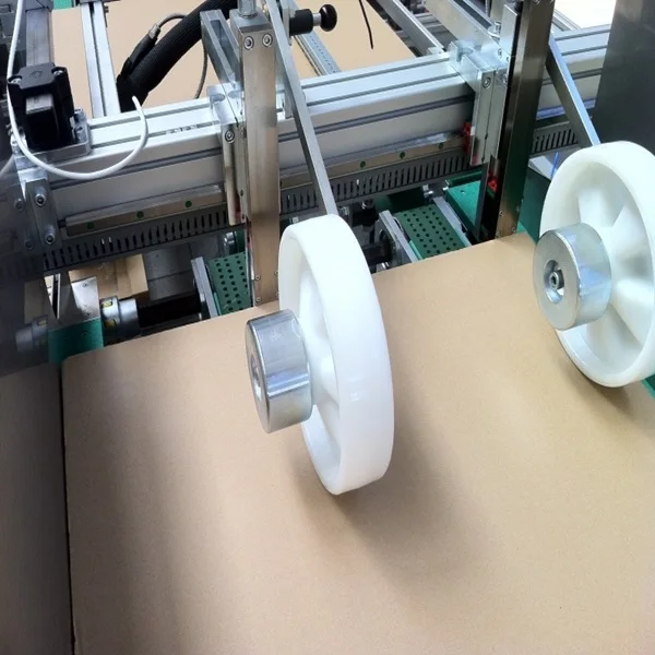 Станок для соединения и складывания двойных коробок