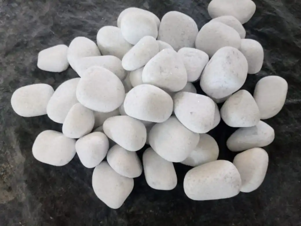 standard grade supper white rough stone marble pebbles tumble stone rocks pavers stepping stone wholesale in IND