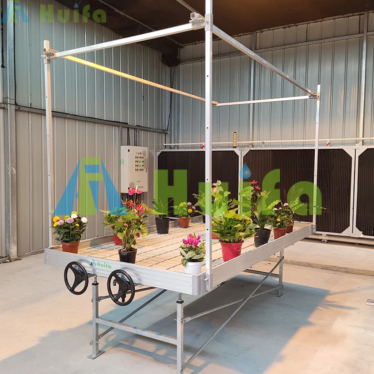 Подвижные вертикальные стеллажи для выращивания растений в теплицах