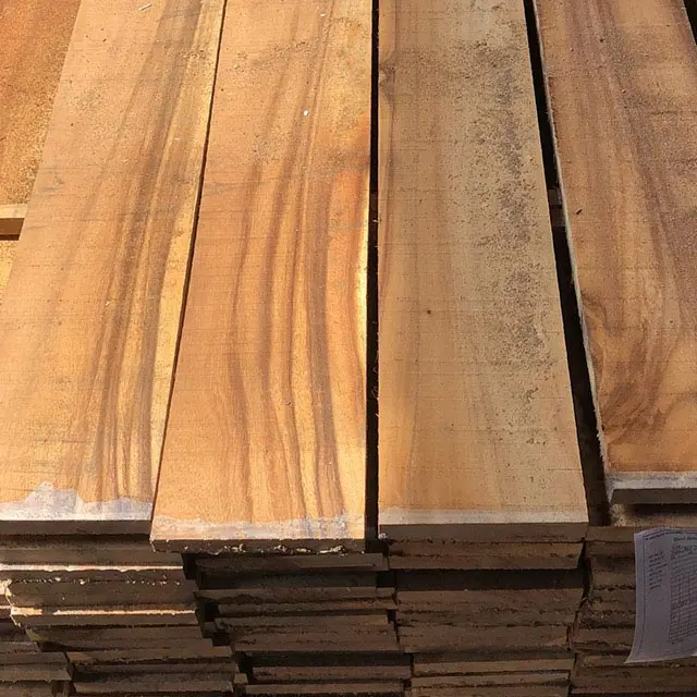Unfinished wood from African Raintree timber, decking boards and wooden panels