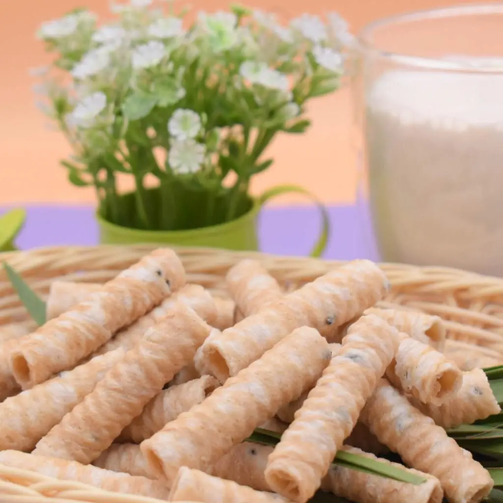 Fresh Coconut Milk, Mango Flavor, Crispy Coconut Rolls Made From Real Coconut Milk Gluten Free And Mango Smoothie.