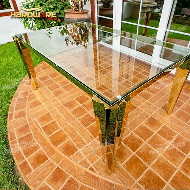 Современный обеденный стол с металлической рамой из прозрачного стекла